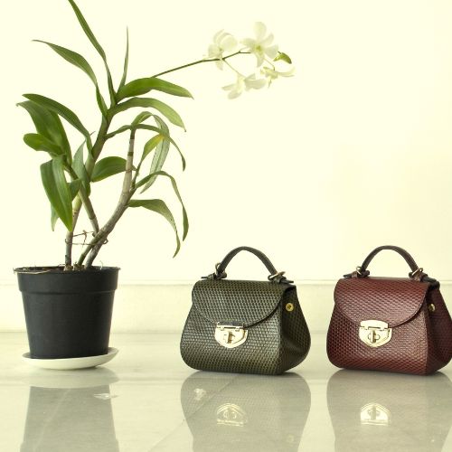 sacs à main en cuir, sacs en cuir tunisien, maroquinerie tunisienne, cuir véritable, sacs de luxe, sacs pour femmes, accessoires de mode, sacs artisanaux, sacs en cuir de cactus