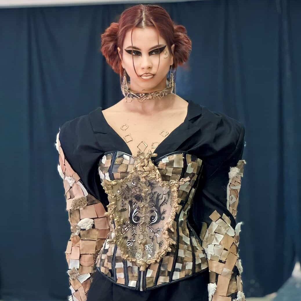 Black corset with 3D patchwork and sculpted resin details
