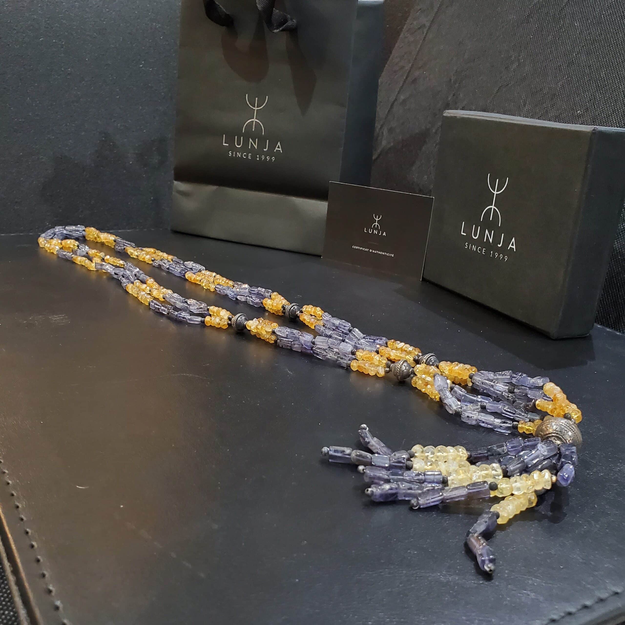 Collier sautoir d’améthyste et de citrine entrelacées de motifs en argent sculpté (80 cm)