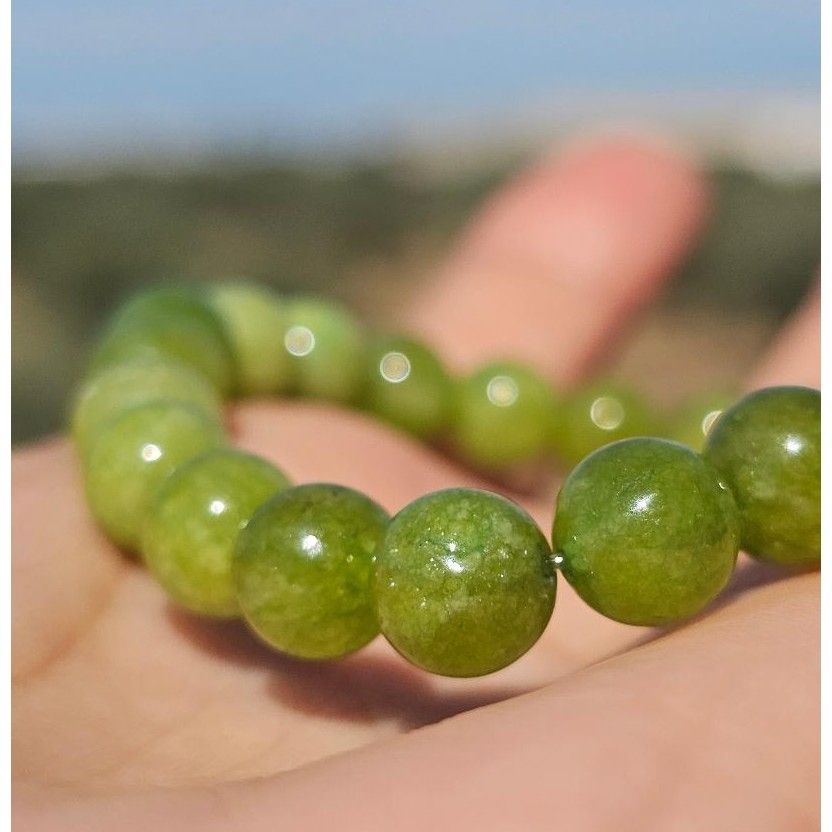 Bracelet péridot élastique en boules de 6 mm pour briller