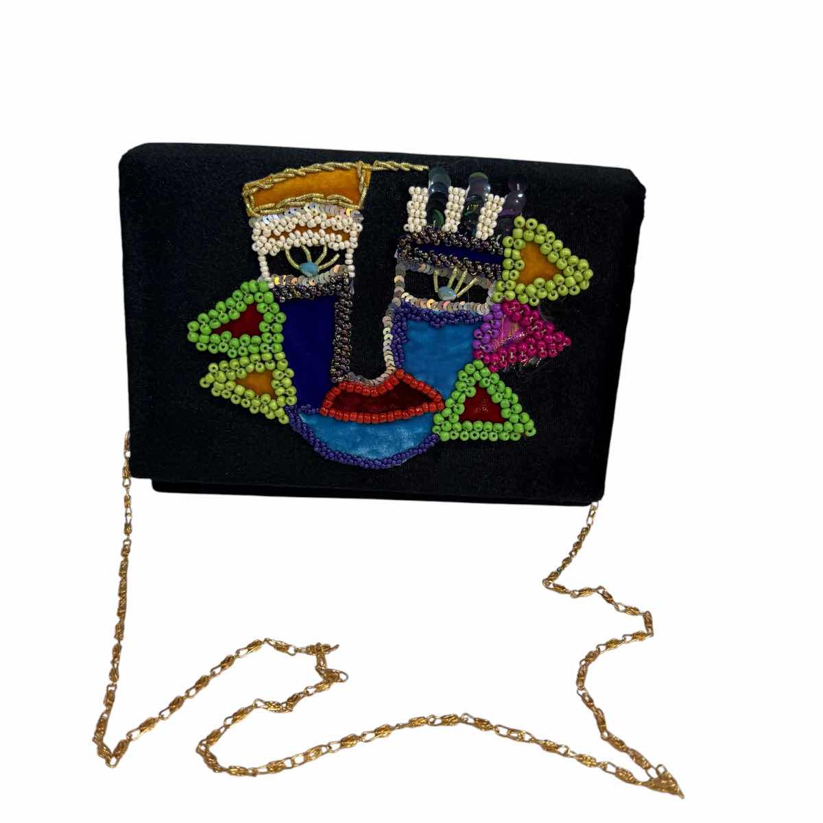 pochette velours noir avec intérieur satin bleu