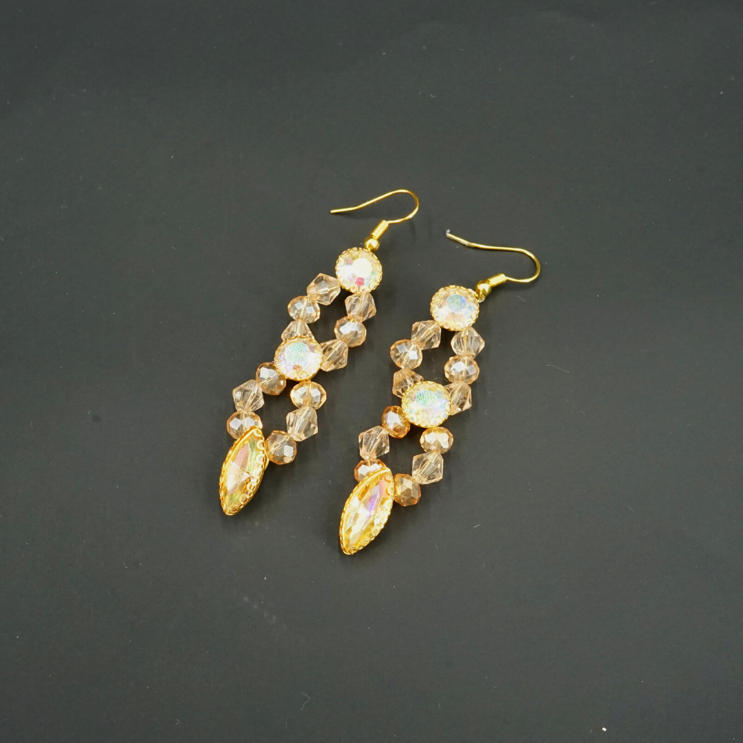 Gold-colored earrings, antique coral pattern