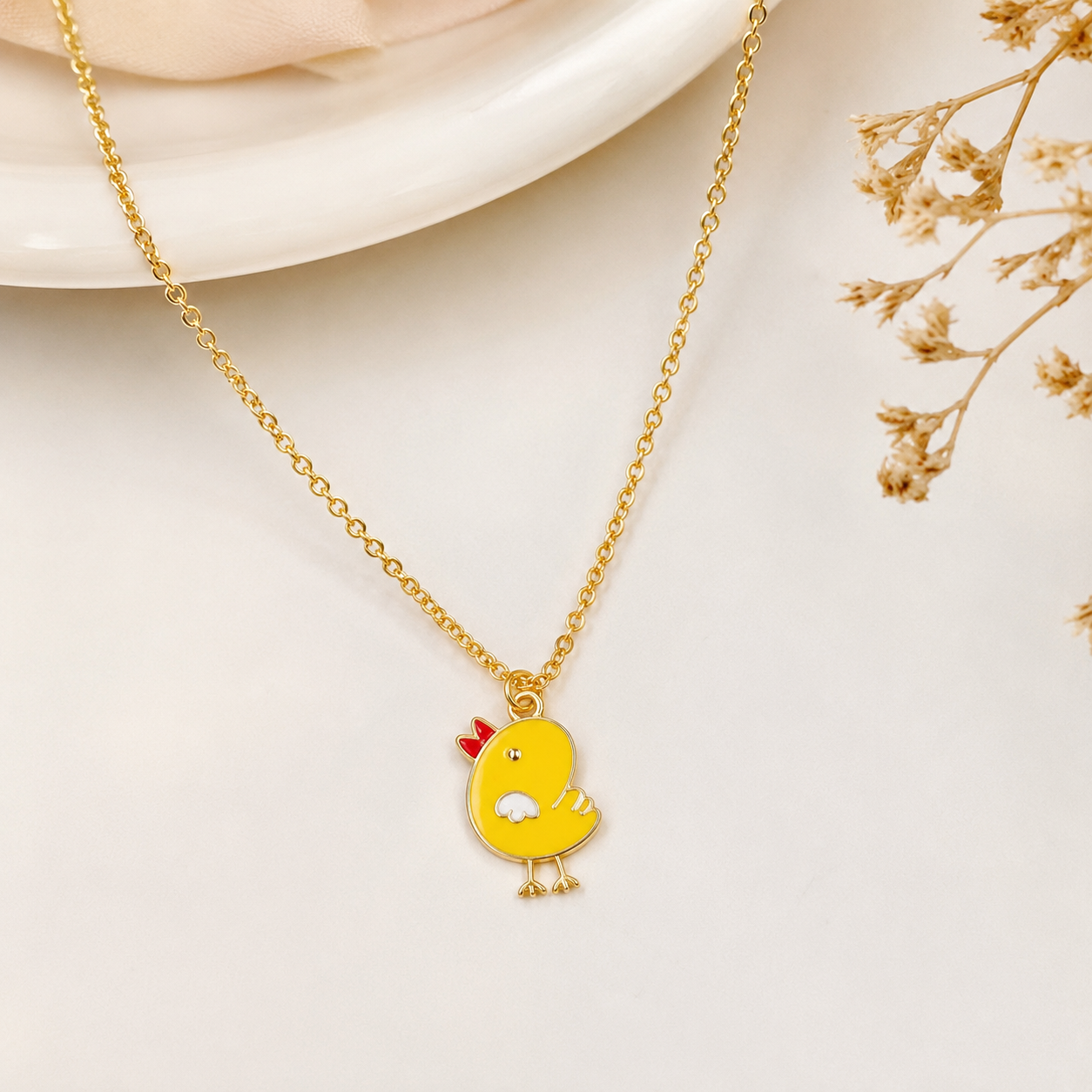 Collier poussin élégant pour un style unique et irrésistible