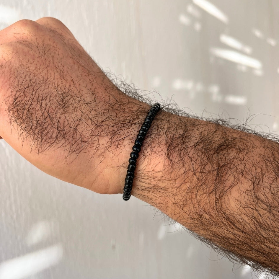 Bracelet en perles noires unisexe