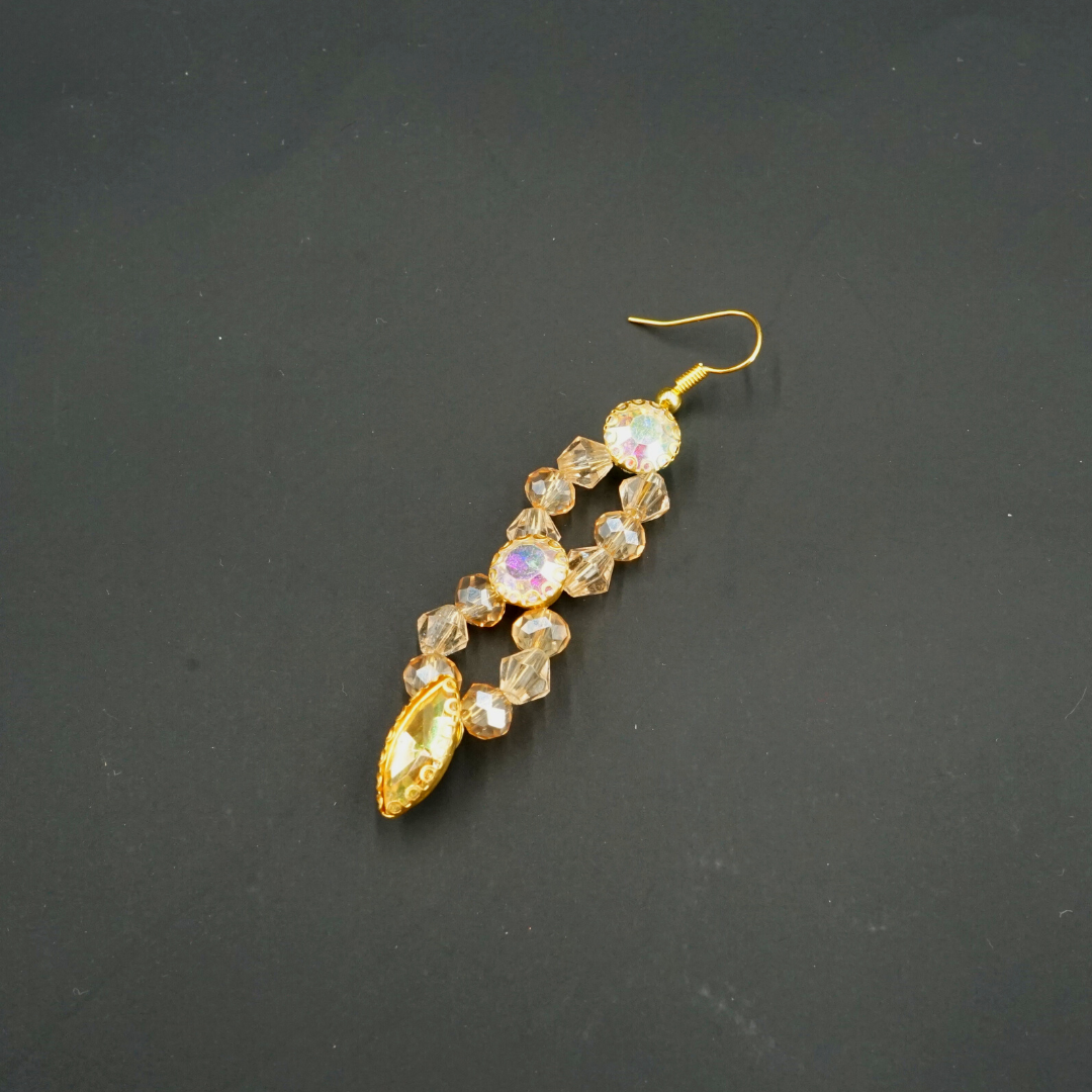 Gold-colored earrings, antique coral pattern