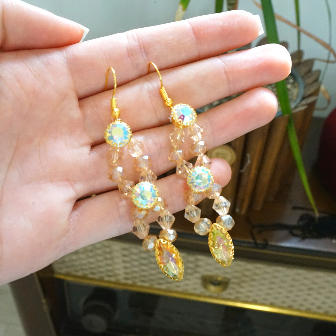 Gold-colored earrings, antique coral pattern