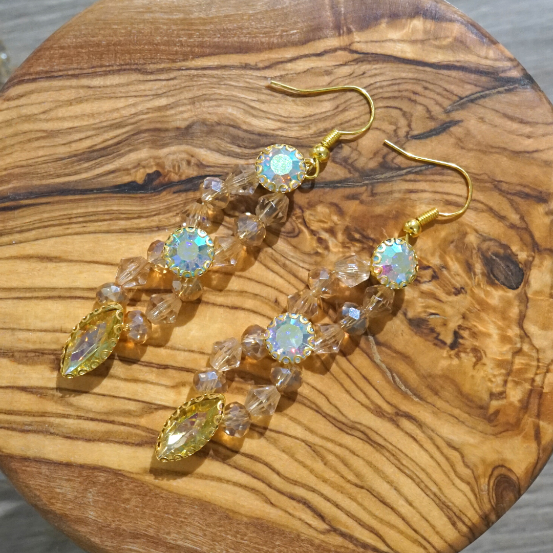 Gold-colored earrings, antique coral pattern