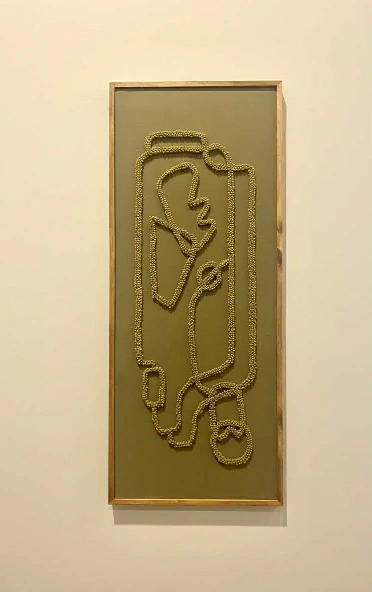 tableau brodé artisanal labyrinthe pour un intérieur élégant