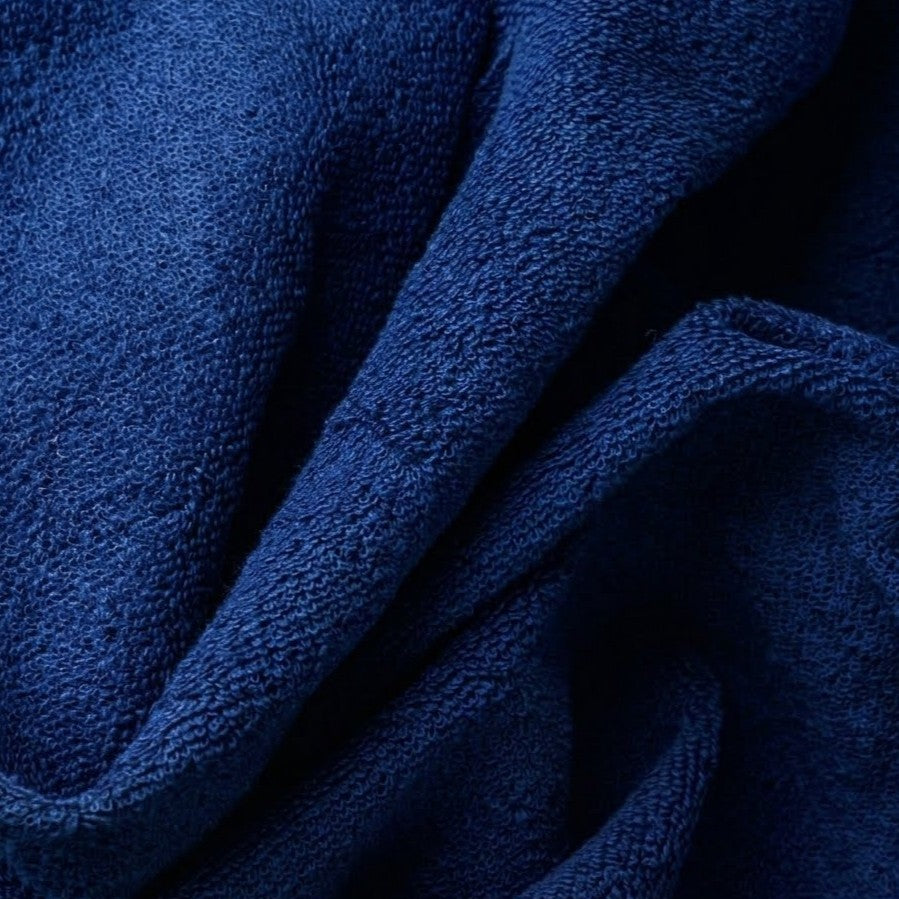 Fouta éponge bleu marine rayée