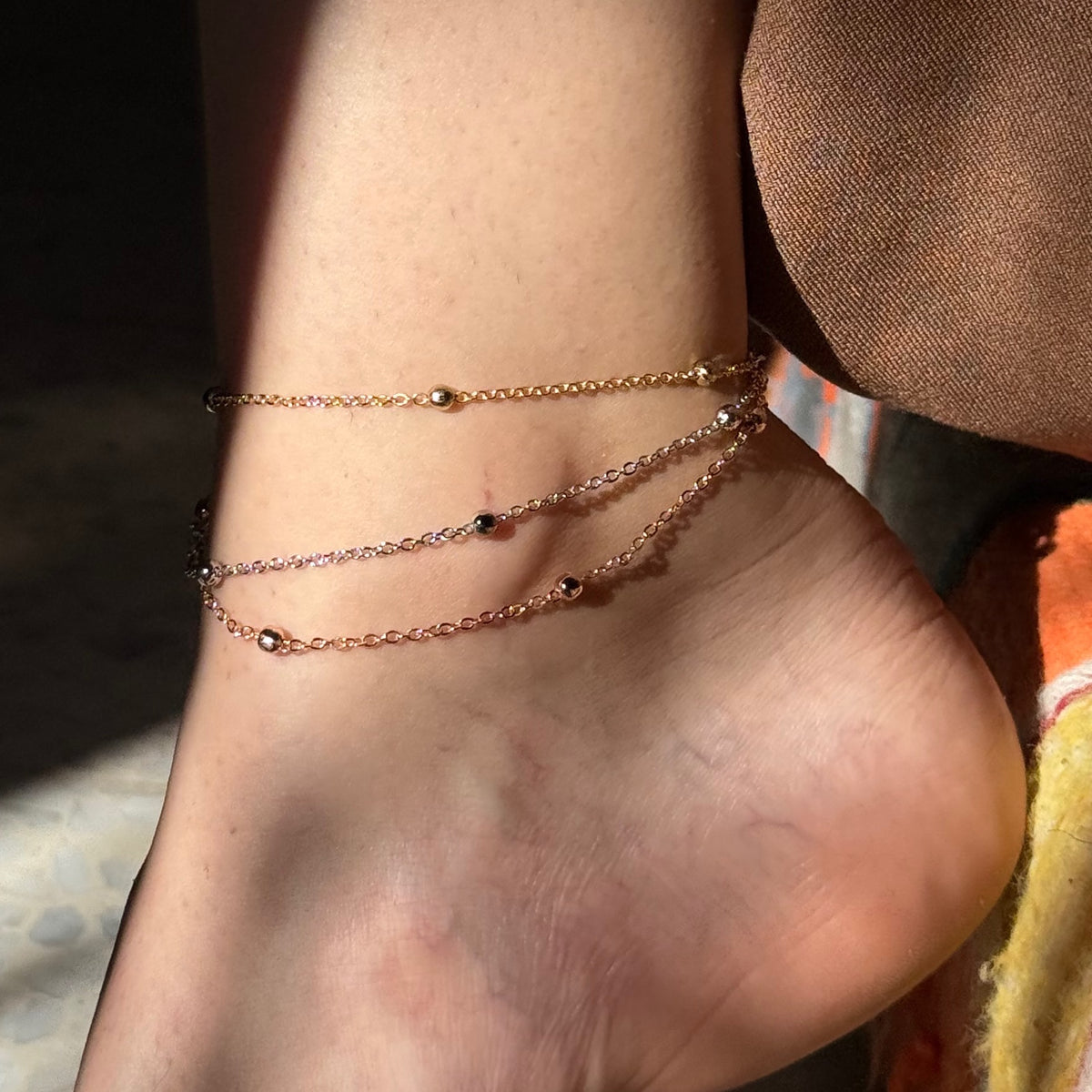 Bracelet cheville en 3 couleur chic pour un style irrésistible