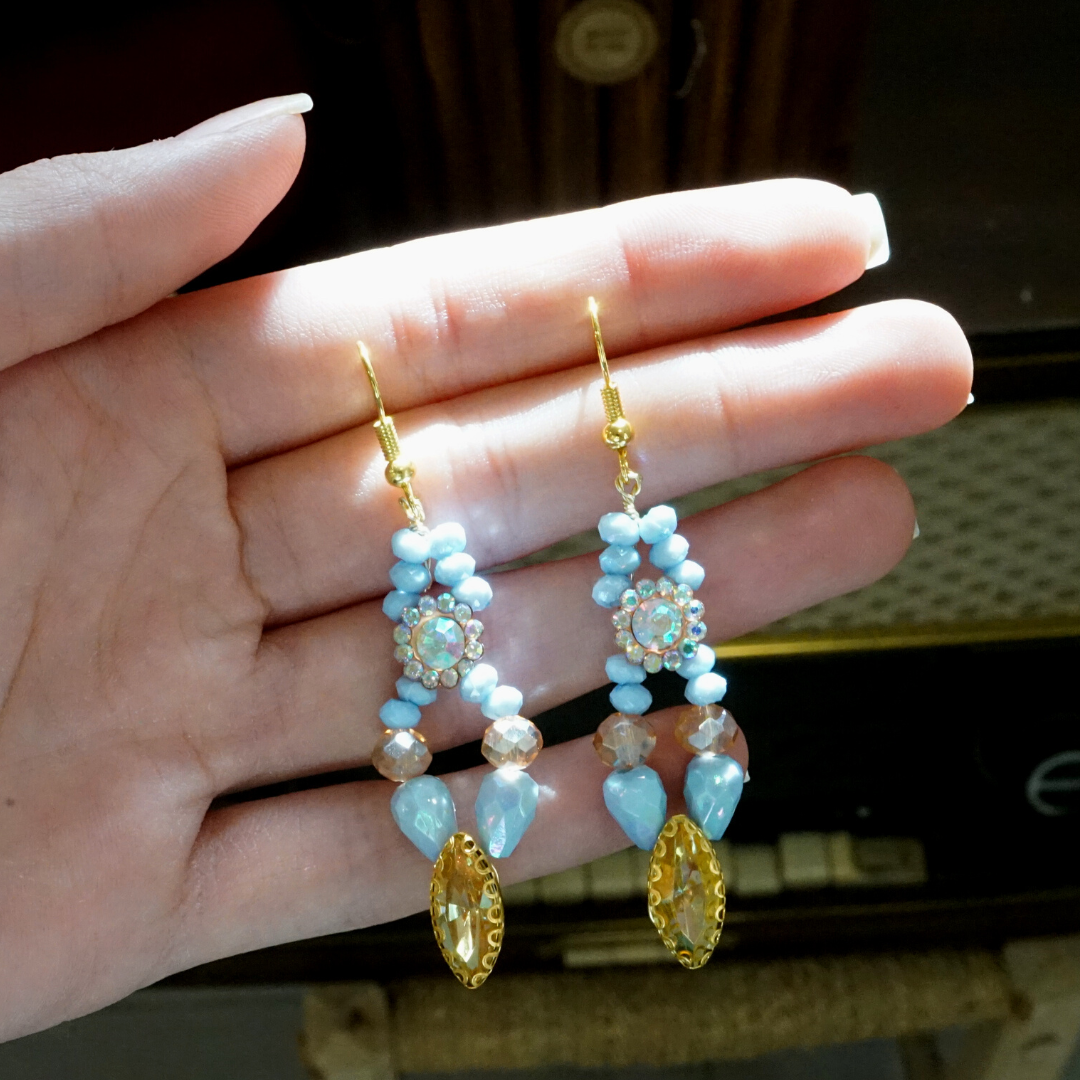 Blue colored earrings, antique coral pattern