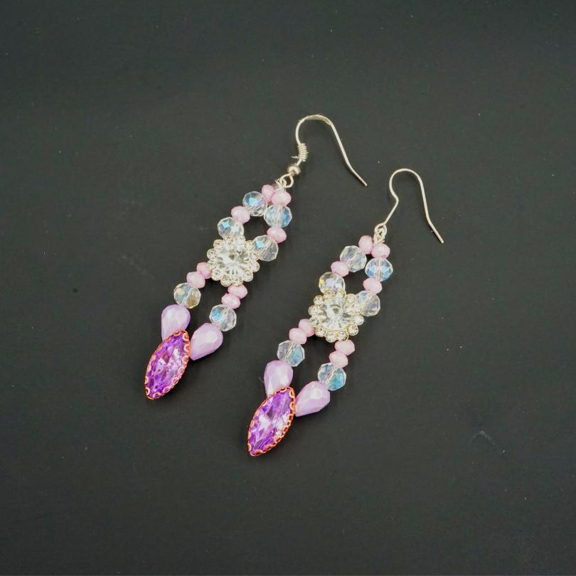 Purple colored earrings, antique coral pattern