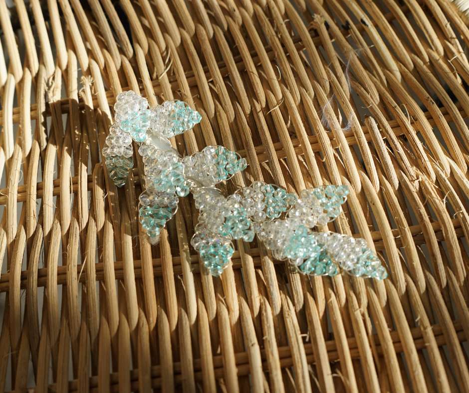 Blue and white diamond-shaped brooch