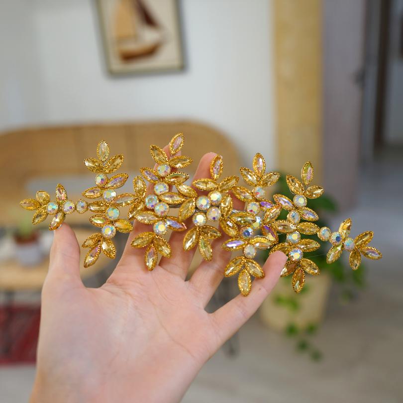 Golden brooch, plant model