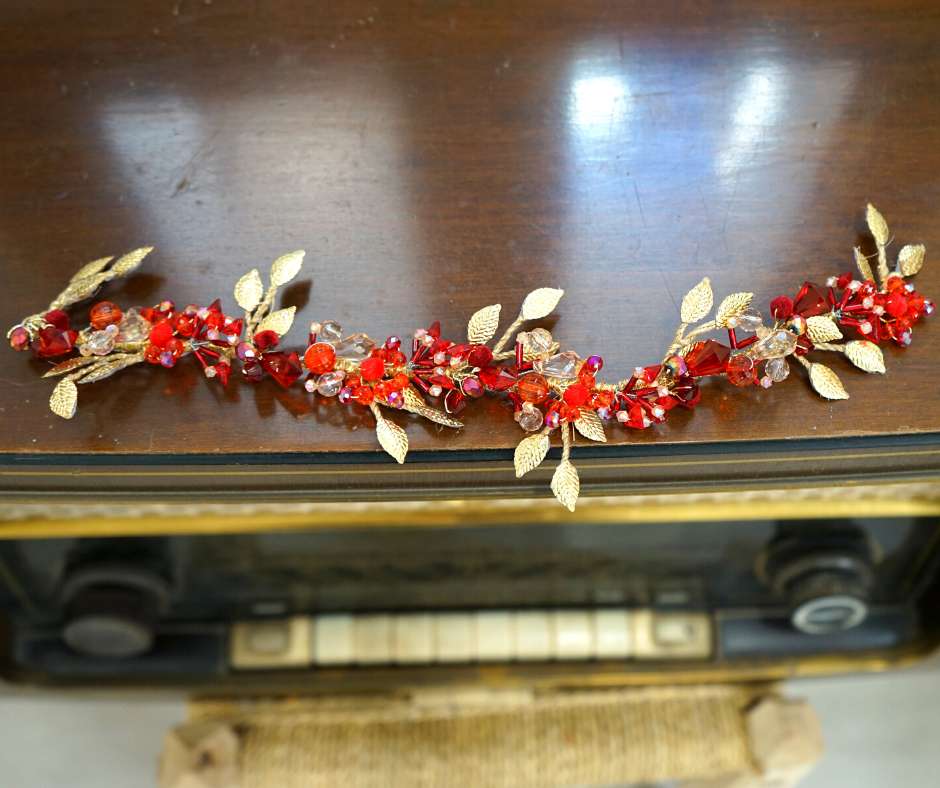 Red/gold brooch, floral pattern