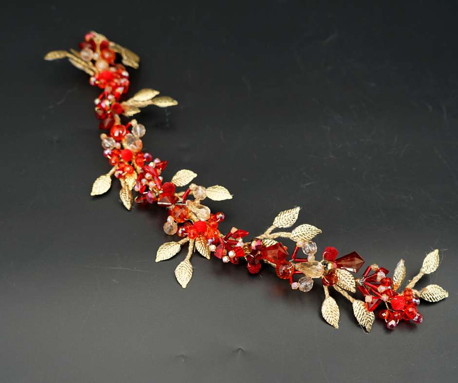 Red/gold brooch, floral pattern