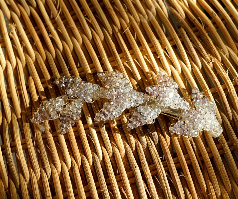 Purple and white diamond-shaped brooch