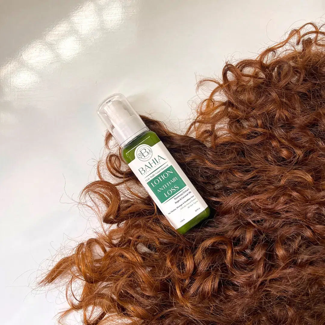 Lotion anti-chute de cheveux à base d'huile essentielle de romarin, huile végétale d'argan et noix de coco