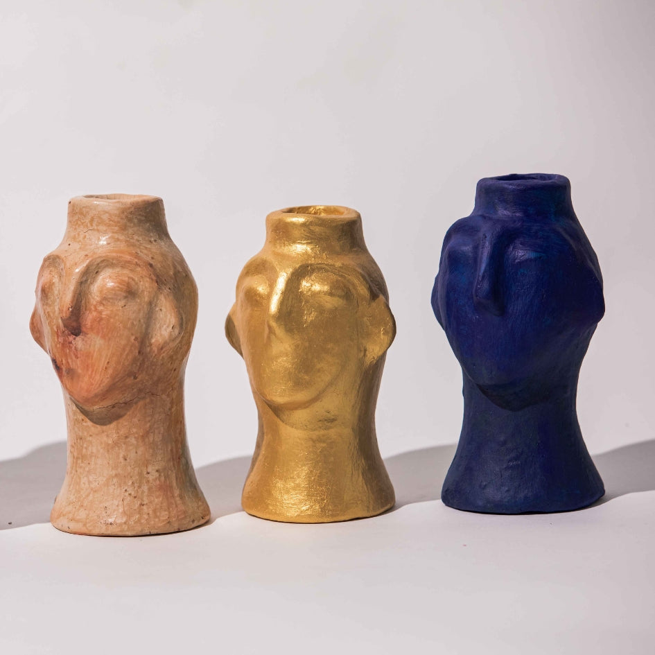 Ceramic sculpted head candle holders