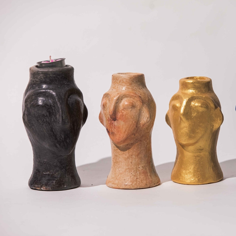 Bougeoirs têtes sculptées en céramique ( hauteur 15 cm, diamètre 6 cm)