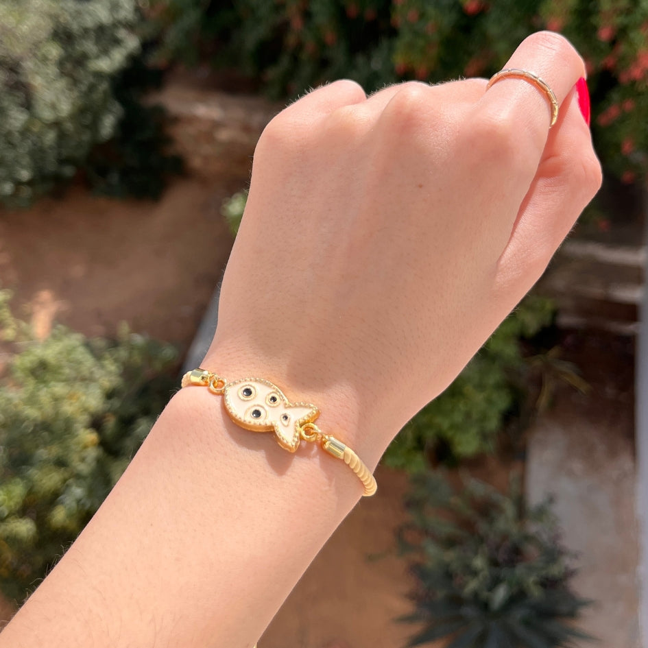 Bracelet Poisson Doré avec Œil Protecteur Ajustable – Élégance et Protection