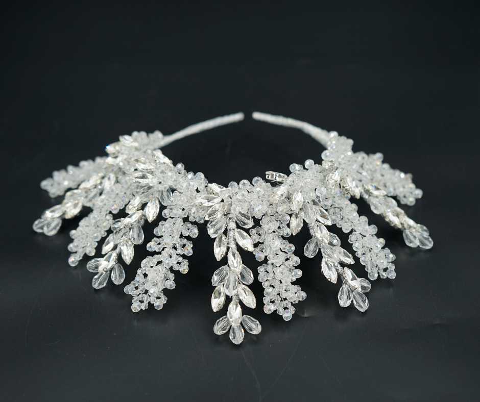 White bridal crown. Swarovski braid model