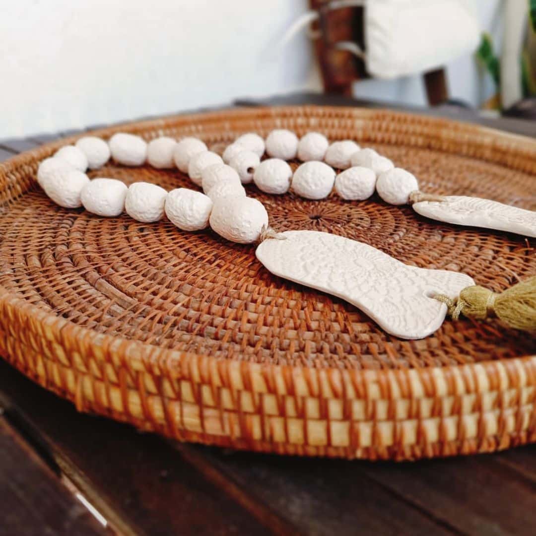 Fish rosary with golden pompom
