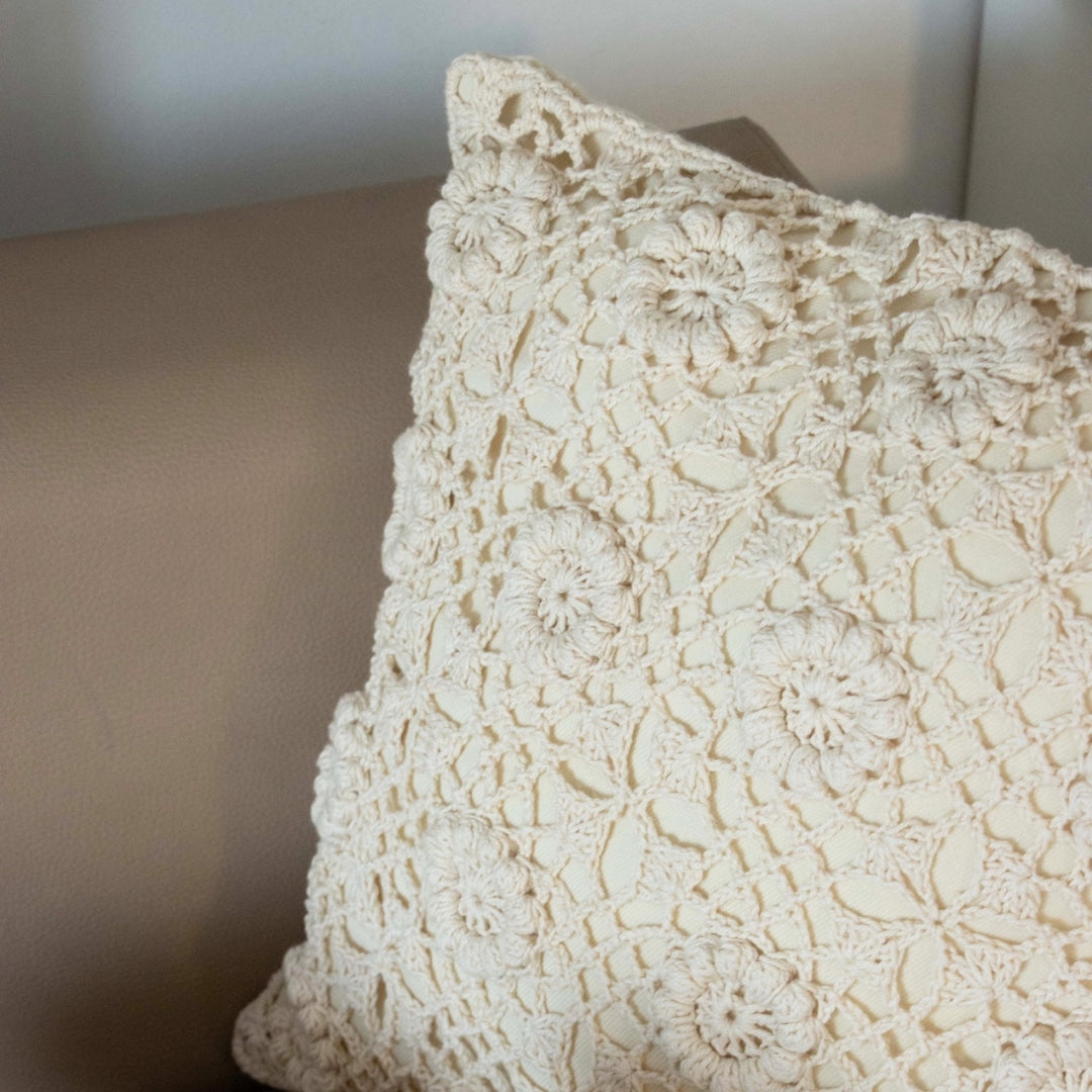 Crochet cushion with floral pattern cushion