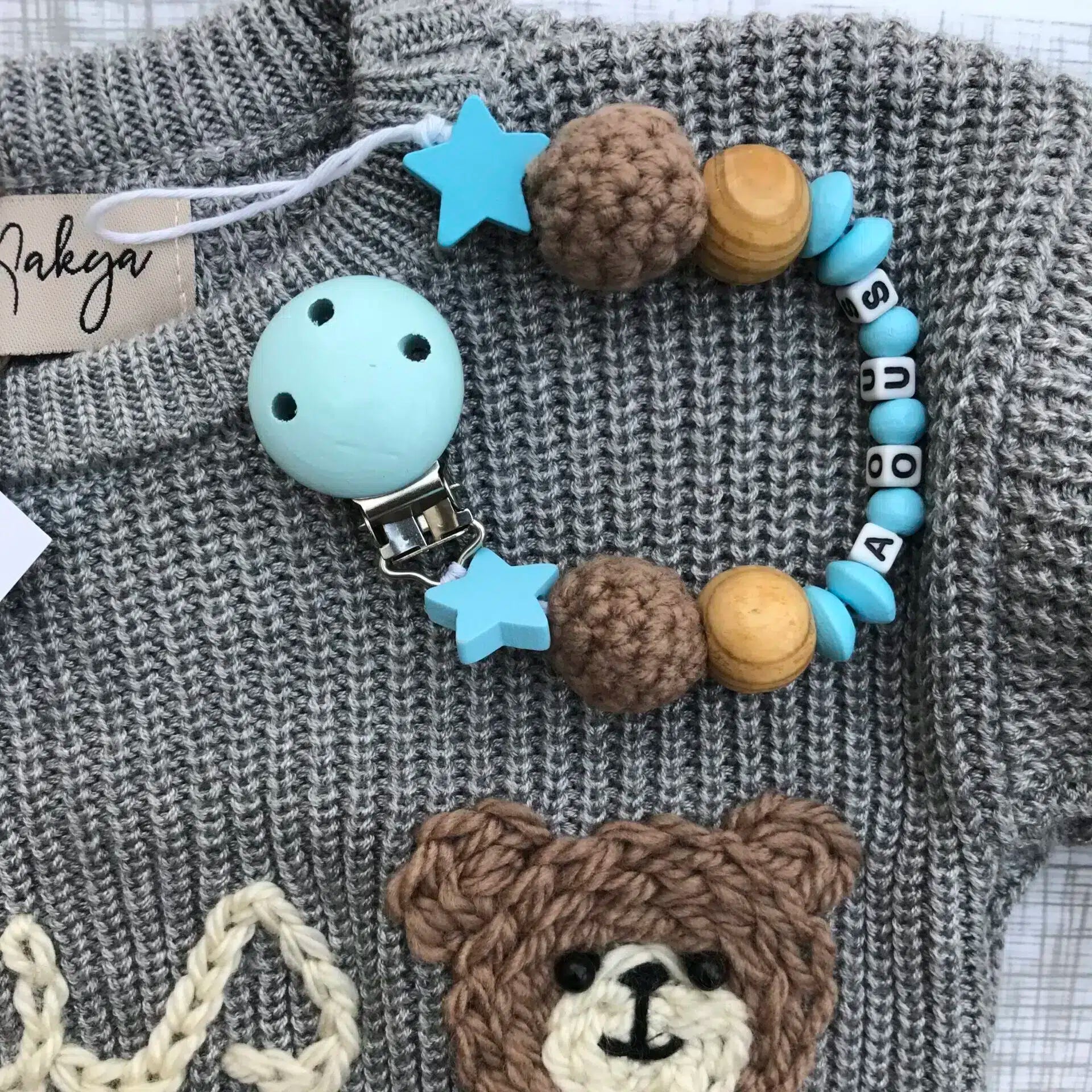 Pull gris oversize en tricot avec un motif ours et porte-sucette, personnalisable avec un prénom