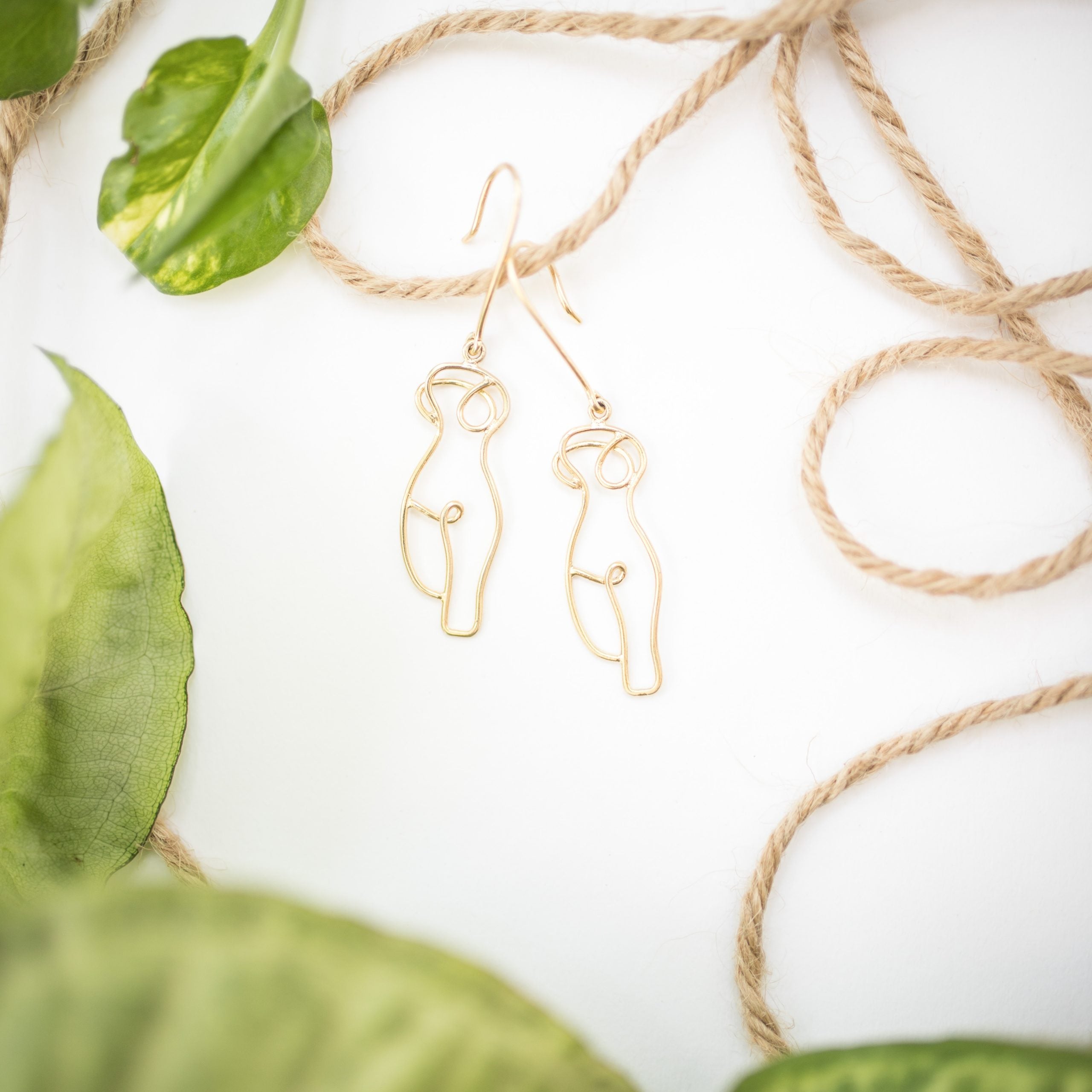 handmade female body earrings in 900 silver