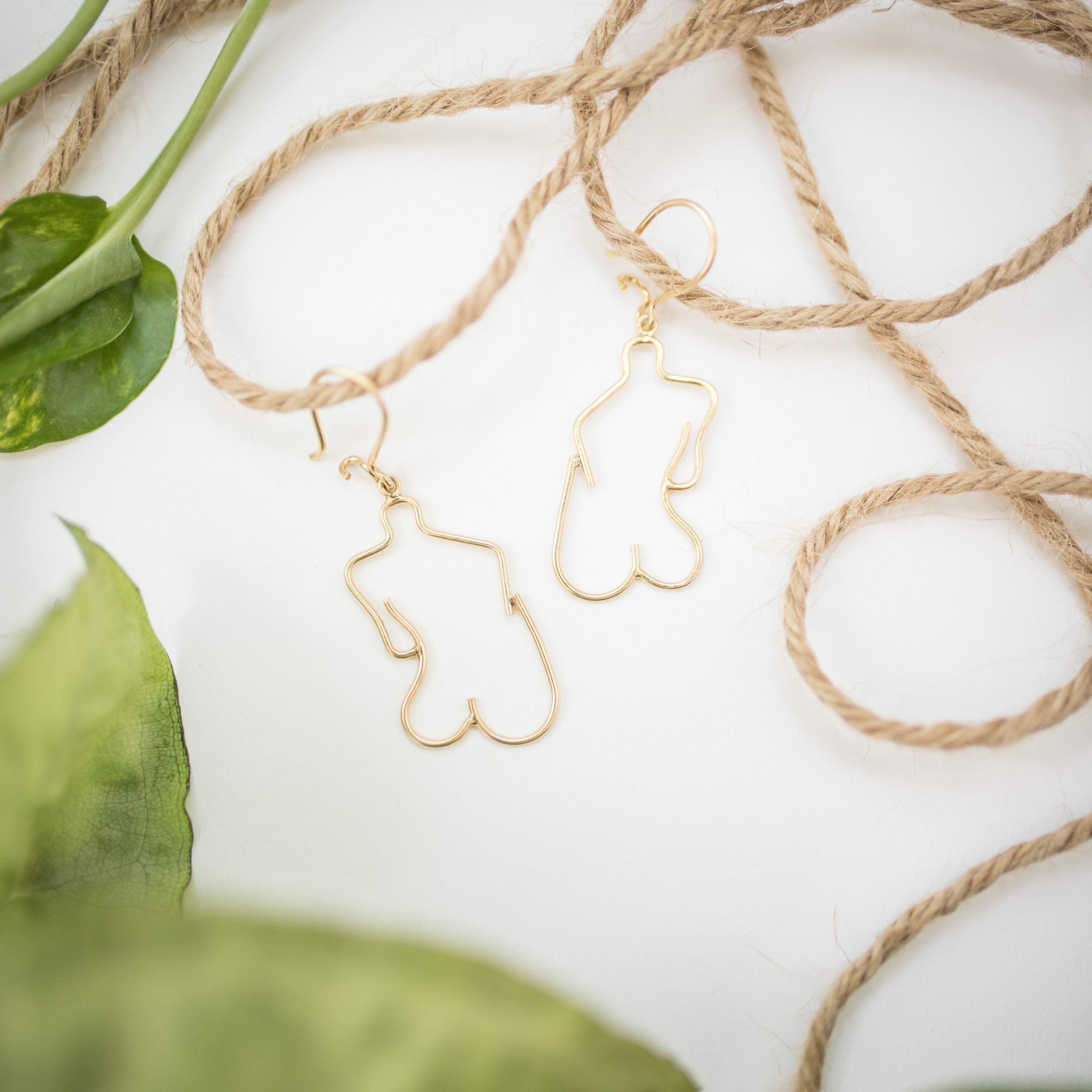 Handmade female body earrings in 900 silver