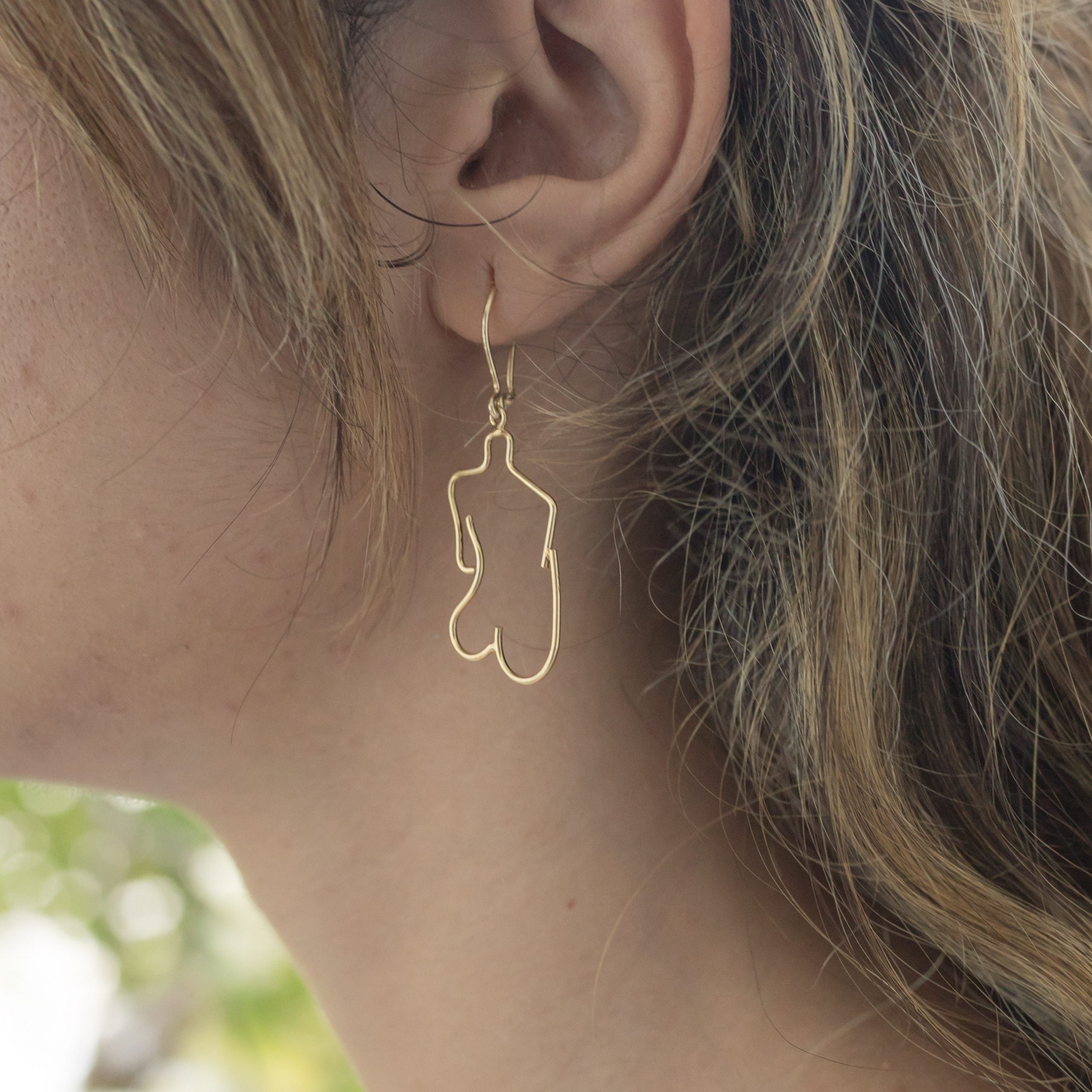 Handmade female body earrings in 900 silver