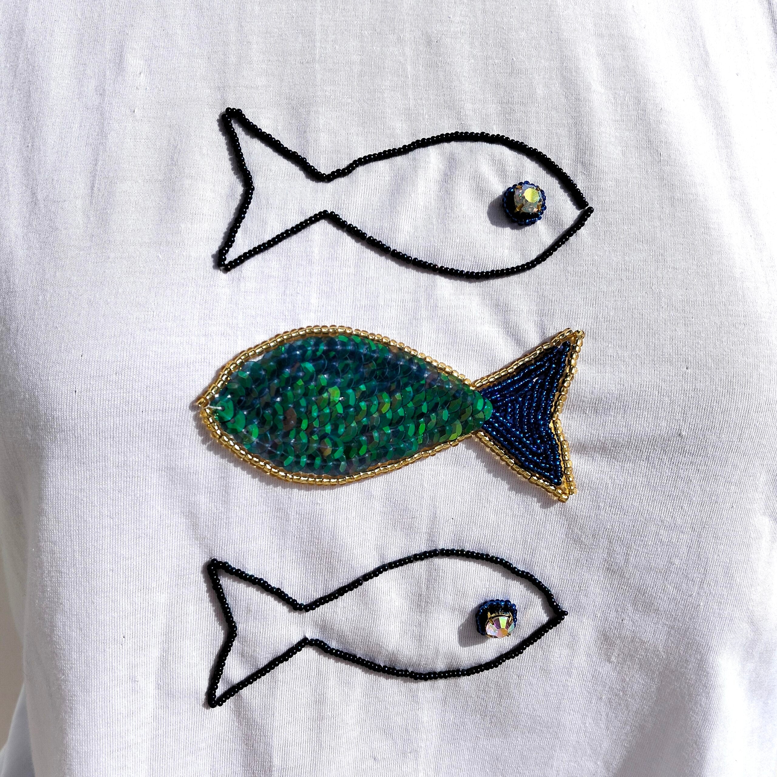 White cotton T-shirt with embroidered blue and green fish pattern