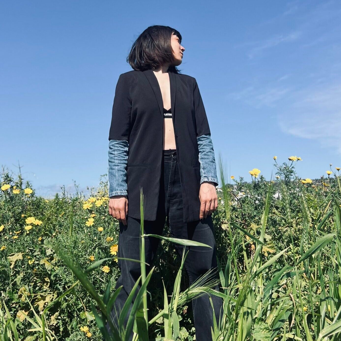 Black blazer with upcycled denim sleeves