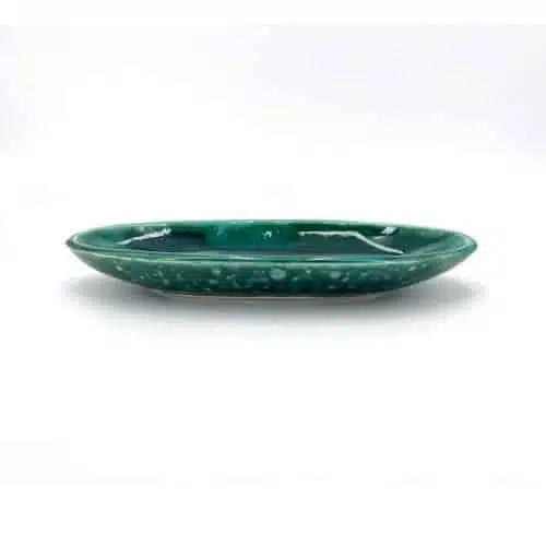 Plat ovale vert en céramique pour fruits secs