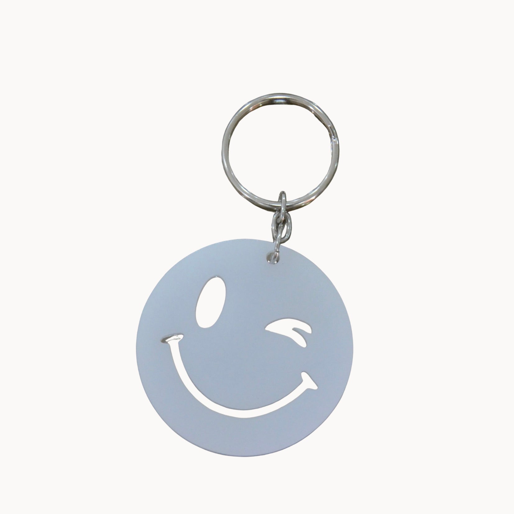 Porte clé smiley clin d’œil en acrylique coloré