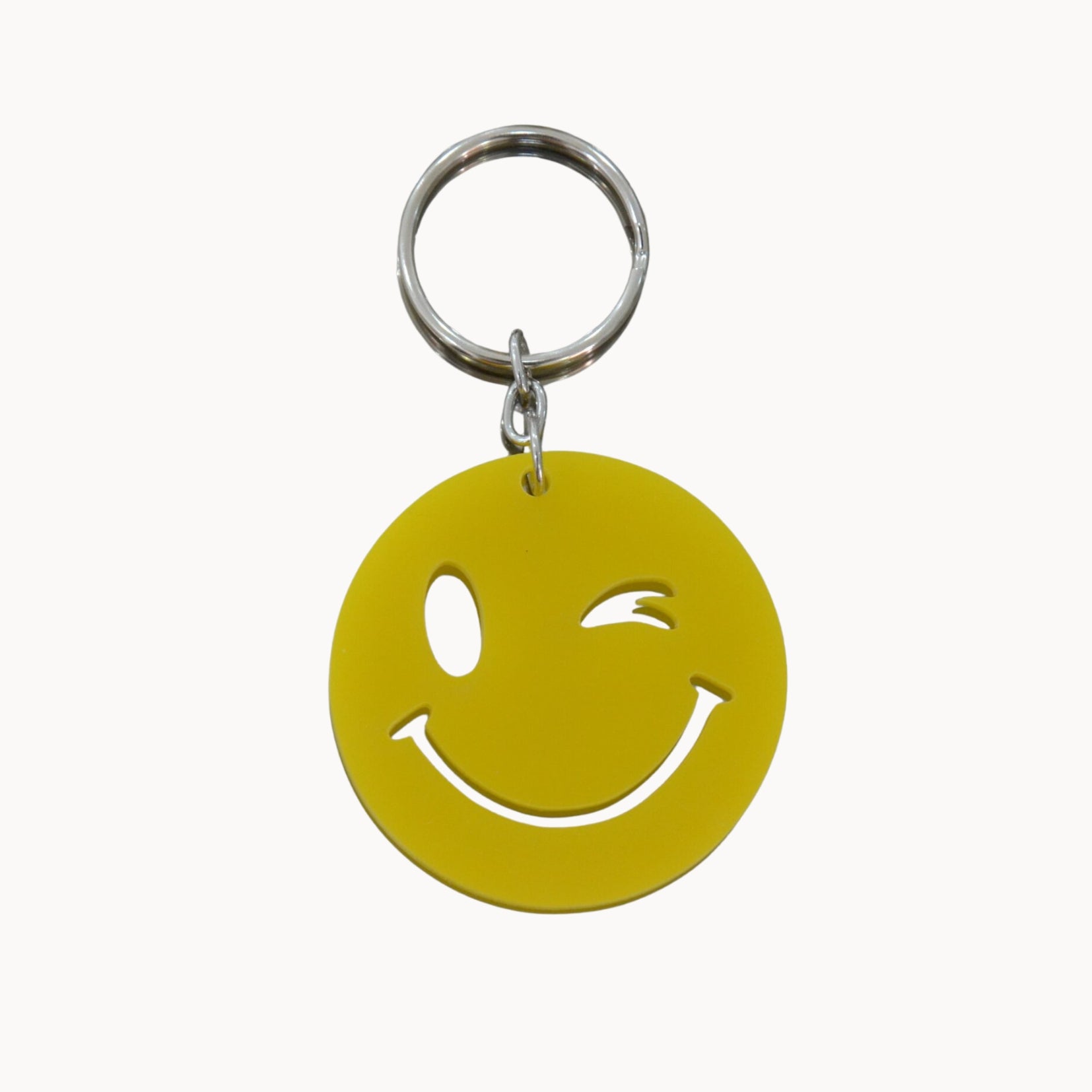 Porte clé smiley clin d’œil en acrylique coloré