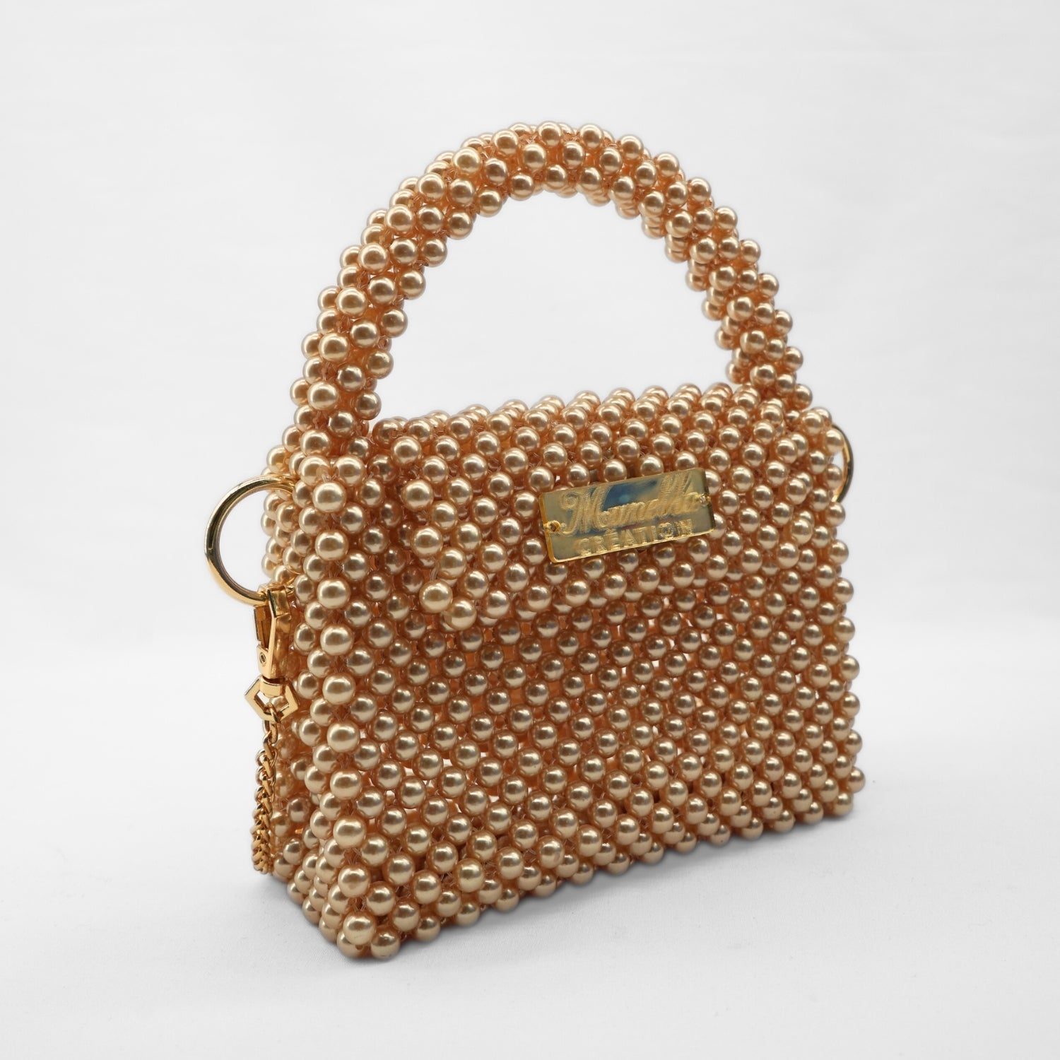 Sac en perle dorée : l'élégance incontournable !