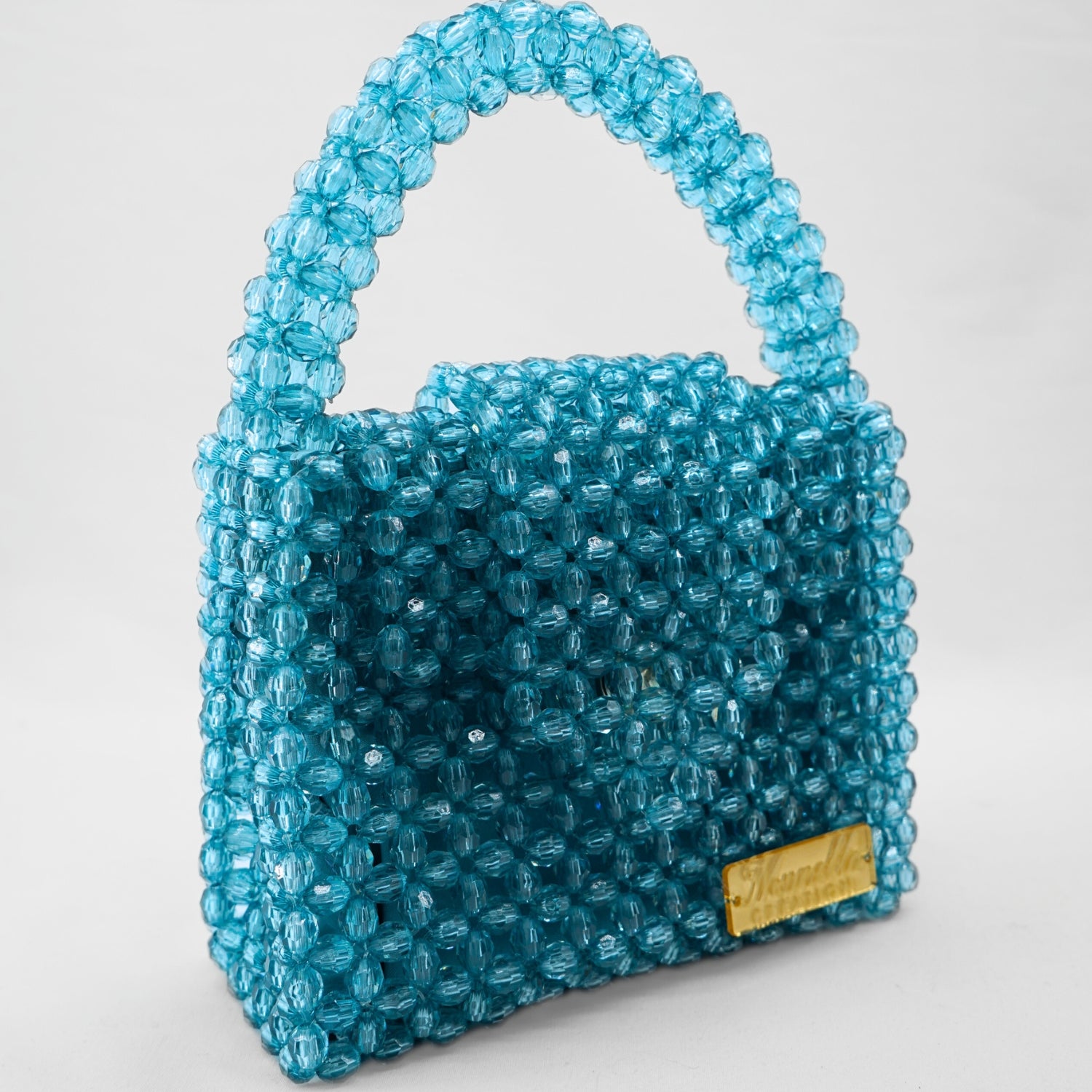Sac perles bleu chic : l'élégance exclusive à portée de main