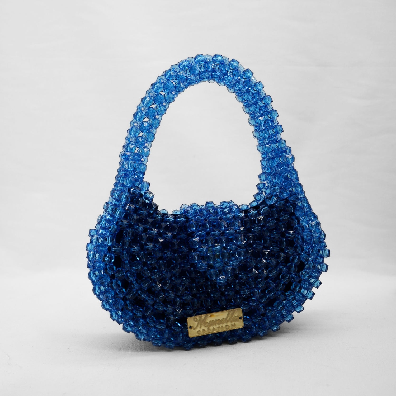 Sac perles bleu foncé : Élégance unique pour sublimer votre style