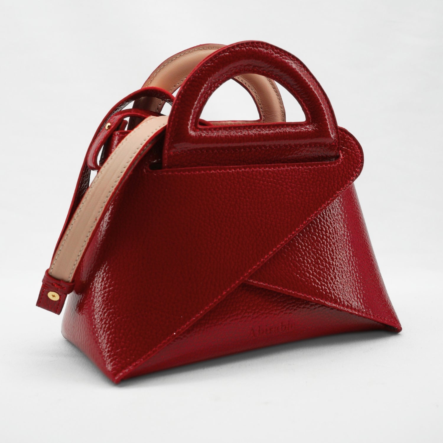 Sac réversible en cuir rouge et rose : élégance artisanale unique