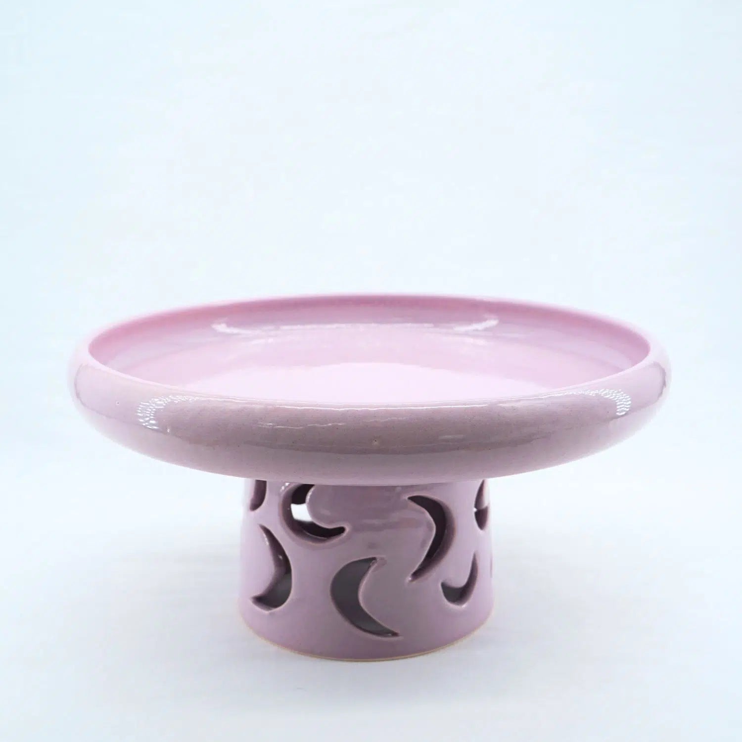 Sousplat céramique ajourée : l'élégance artisanale à table