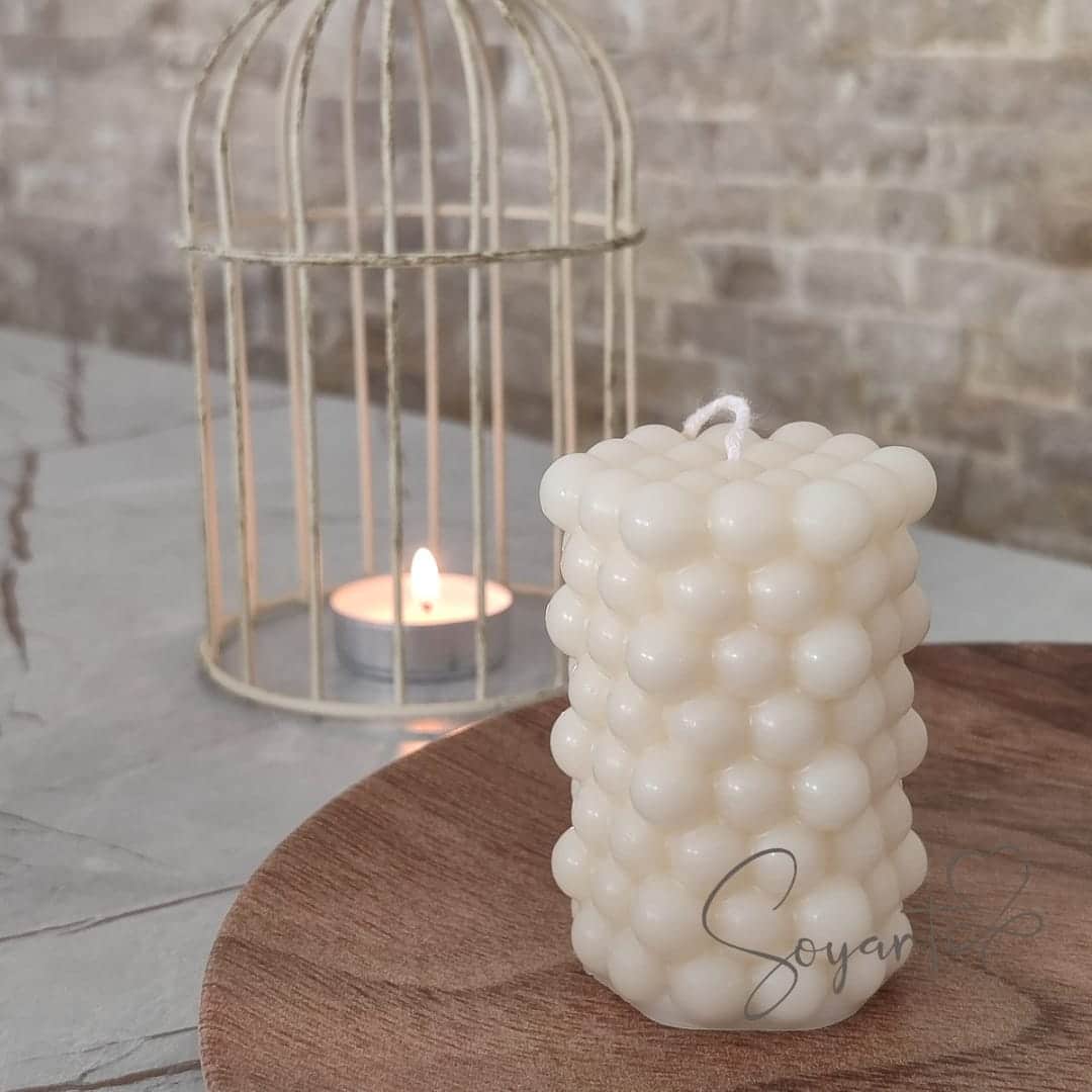 Natural pearl-shaped candle