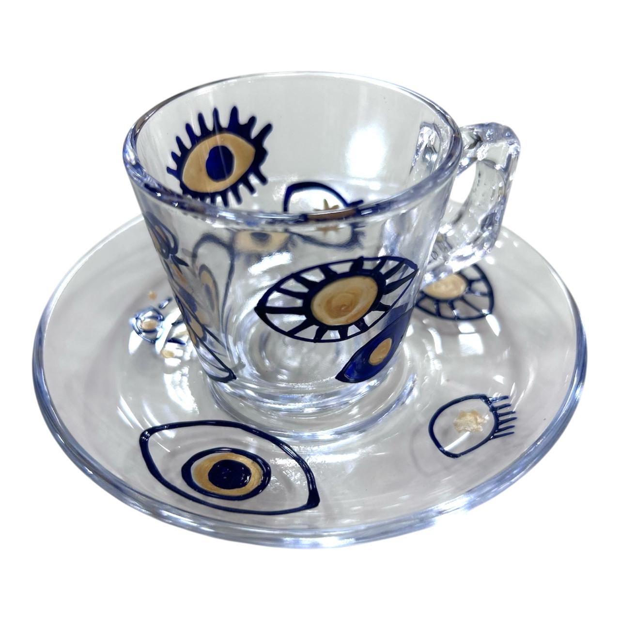 Un coffret bleu composé de Tasse et sous-tasse en verre - Motif Oeil