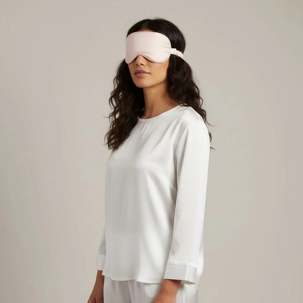 masque de sommeil satin luxe Peche rosé bebe clair pour un repos parfait