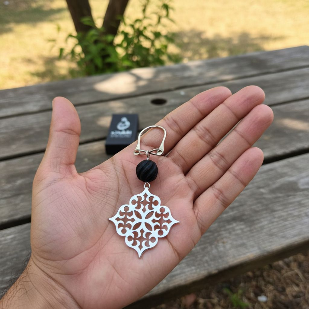 porte clés luxe avec boule Ambre noir une touche d'élégance