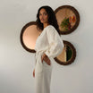 miroir rond élégant en marron pour un style raffiné