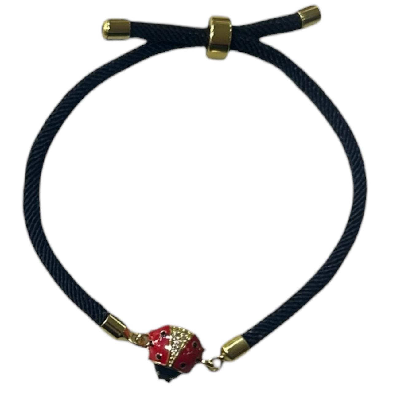Bracelet en cordon NOIR avec coccinelle ROUGE aux ailes ouvertes