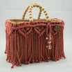 Couffin macramé élégant avec des boules en bois