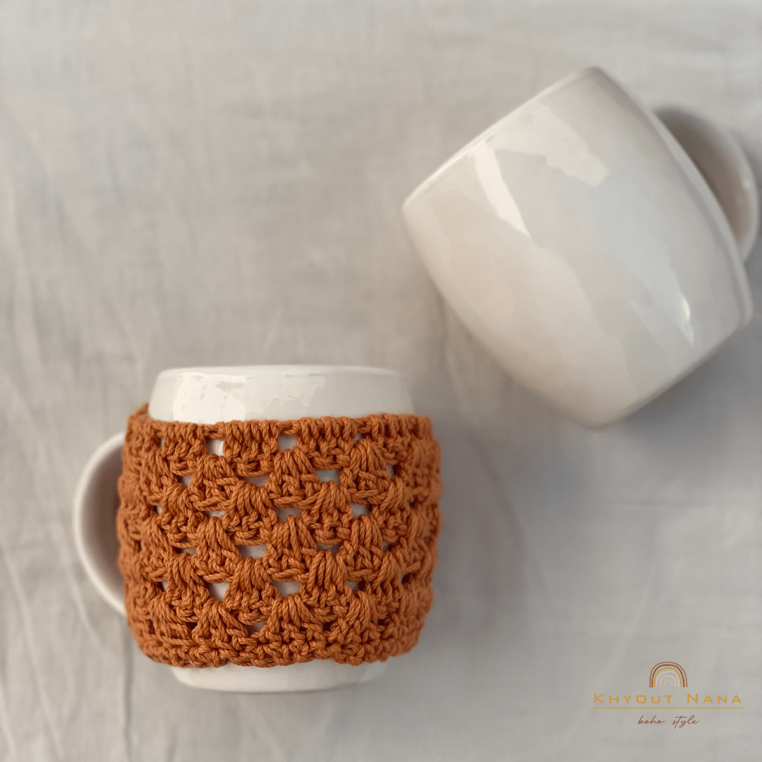 Mug with multi-colored crochet mug cover